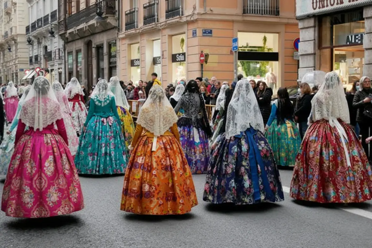 Pasacalles de Fallas en Valencia con moños de fallera cosidos, firmes y bien fijados